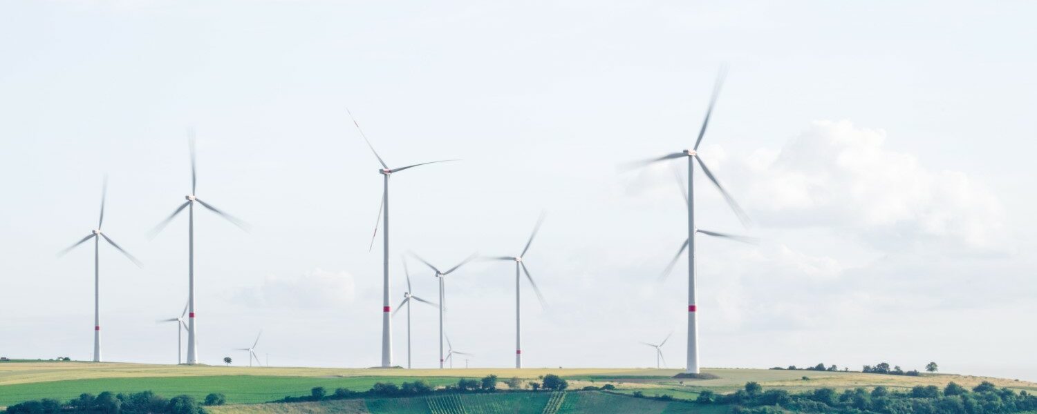 Wind power generators in a field